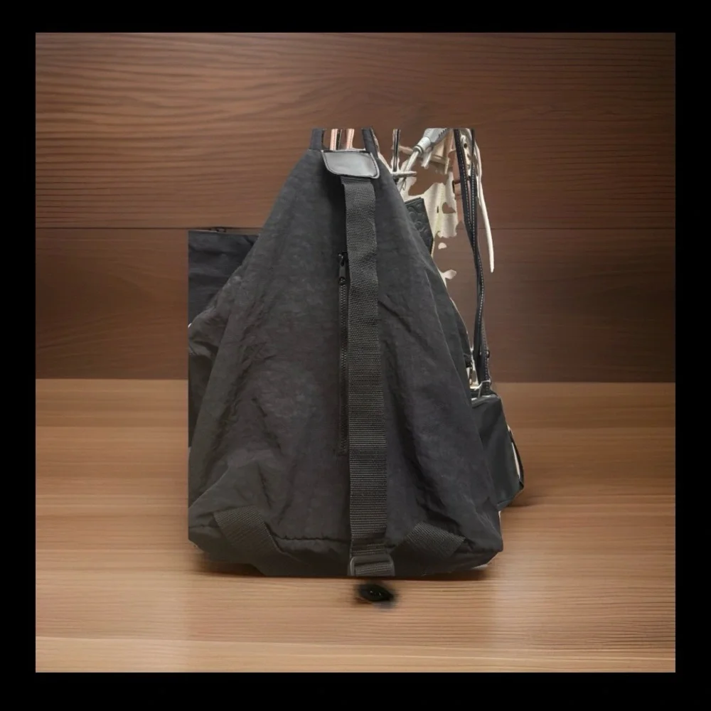 GAIAM Black Sling Backpack - Compact Crossbody Pack